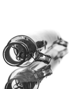 A close up of a laboratory glassware being repaired